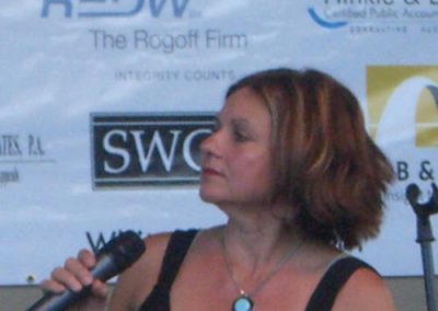 Photo of woman with microphone