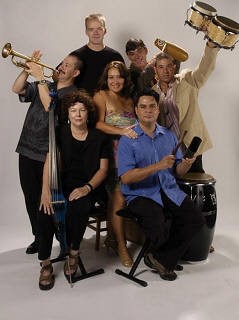 band posing for photo with instruments