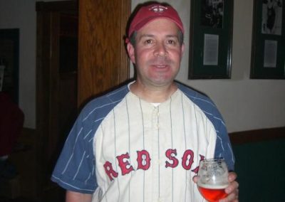 Man dressed with red socks jersey