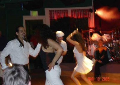 two couples dancing on dance floor