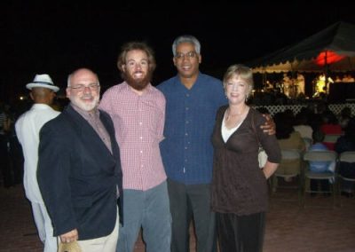 four people posing for a photo