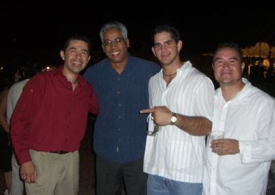 four people posing for a photo