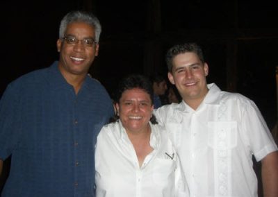 three people posing for a photo