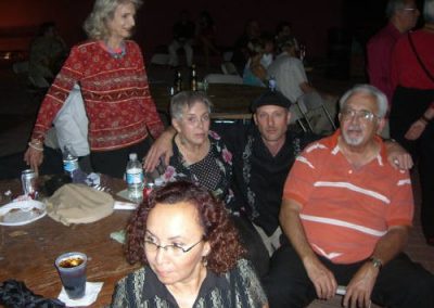 three people posing for a photo