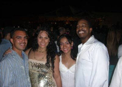 four people posing for a photo