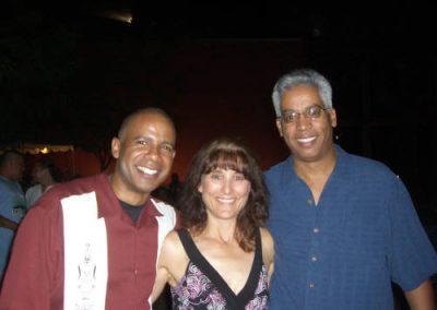 three people posing for a photo