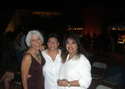 three people posing for a photo