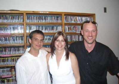 three people posing for a photo