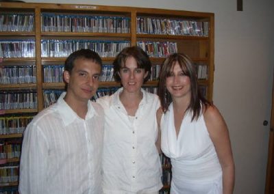 three people posing for a photo