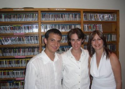 three people posing for a photo