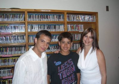 three people posing for a photo