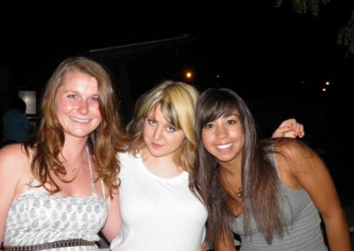 Three women posing for picture