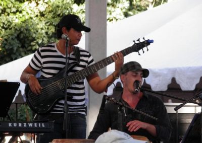 Two guys playing instruments