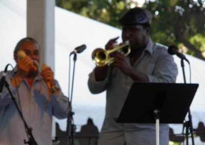 Two guys playing instruments