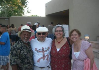 Group of four posing for picture