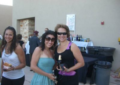 Two ladies posing for picture